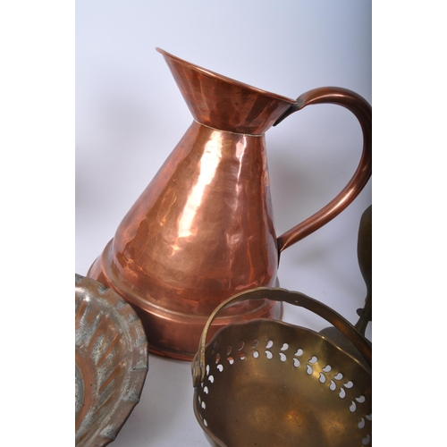 394 - An assorted collection of brass and coppers ware to include a 19th century Victorian hammered copper... 