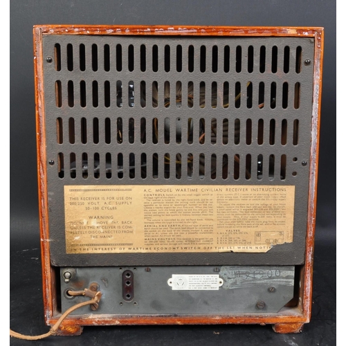 399 - A WWII World War Two circa. 1950's wartime civilian receiver. Issued by the B.T.H Co. The radio bein... 