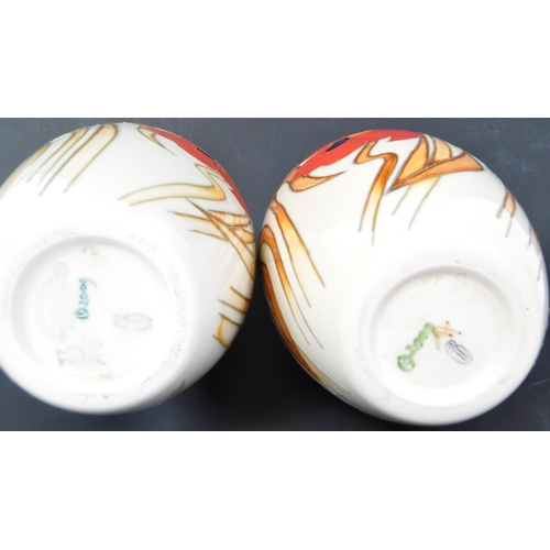 4 - A pair of contemporary Moorcroft Harvest Poppy pattern vase having a bulbous shape. Both marked to b... 