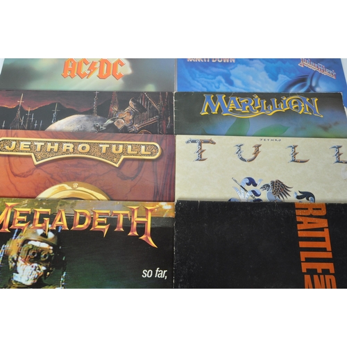 400 - An assortment of 20th century LP long play vinyl records. The lot to include ACDC Blow Up Your Video... 