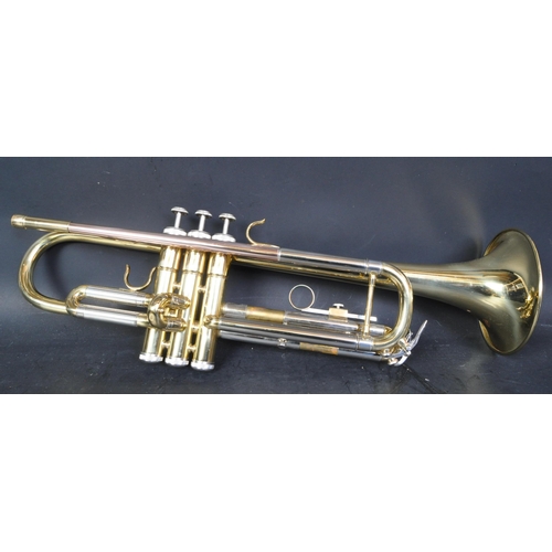 401 - John Packer 151 - A vintage 20th Century brass musical trumpet instrument, with mouthpiece. With bla... 