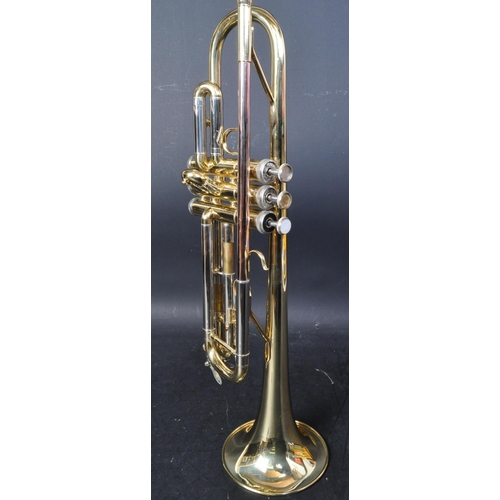 401 - John Packer 151 - A vintage 20th Century brass musical trumpet instrument, with mouthpiece. With bla... 