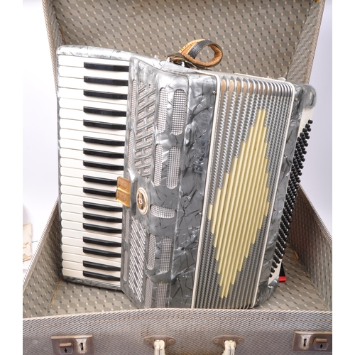 405a - A retro vintage mid 20th century circa. 1950's Riccardo accordion in case.