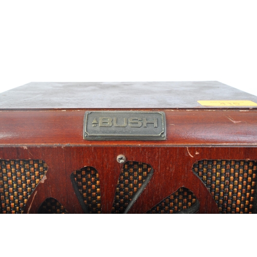 415 - A retro vintage 20th century Bush valve radio with three frontal tuning dials on central stations fa... 