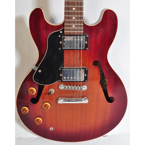 422 - Aria Guitars  - Model No. TA-40-LVSB - An Aria left handed electric guitar with a hollow body in che... 