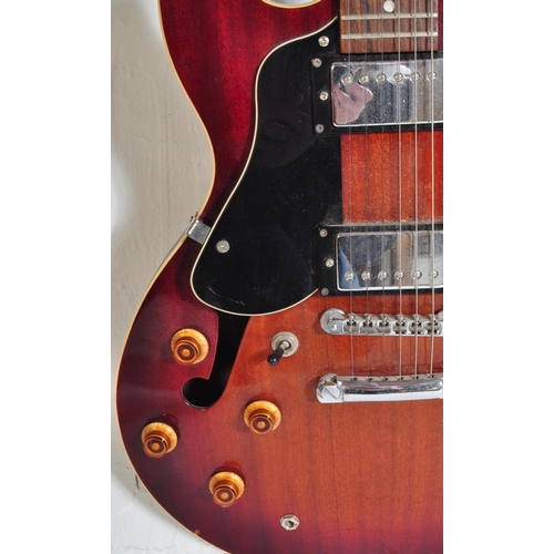 422 - Aria Guitars  - Model No. TA-40-LVSB - An Aria left handed electric guitar with a hollow body in che... 