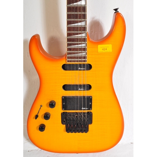 424 - Charvel Guitar - Serial No. 331121- An Charvel left handed electric guitar with an orange sunburst b... 