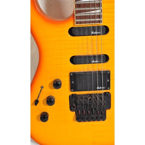 424 - Charvel Guitar - Serial No. 331121- An Charvel left handed electric guitar with an orange sunburst b... 