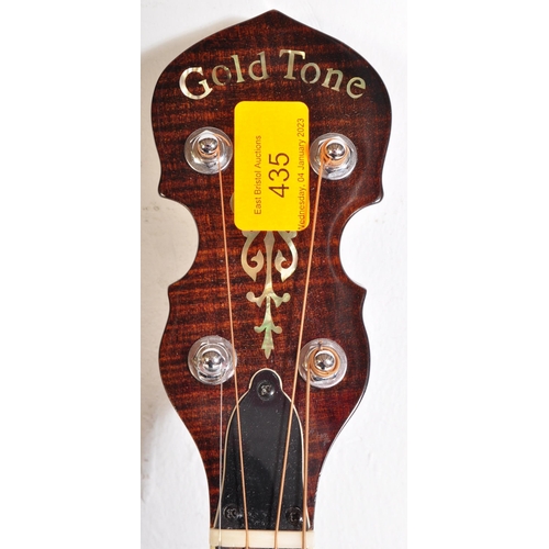 435 - Gold Tone Banjo. The instrument set for left handed use. Having a decorated inlaid head stock with f... 