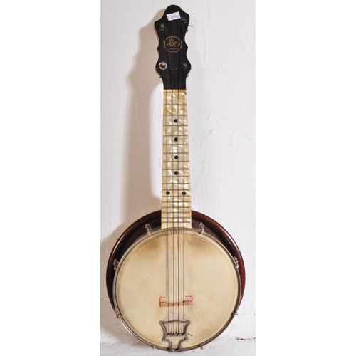 439 - A John Grey & Sons of London - Original vintage 1920s / 1930s banjolele with pearlescent Bakelite de... 