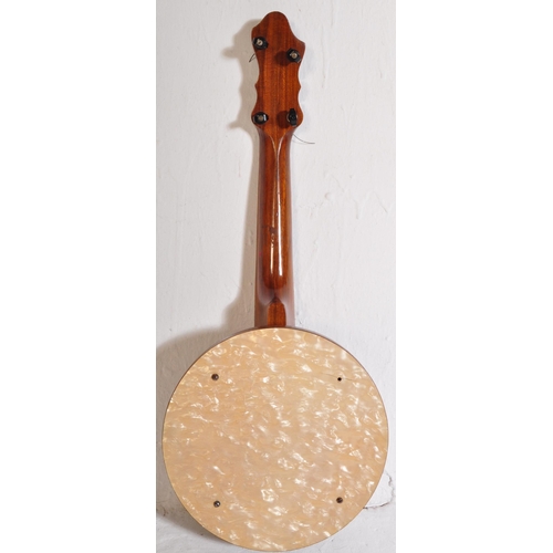 439 - A John Grey & Sons of London - Original vintage 1920s / 1930s banjolele with pearlescent Bakelite de... 