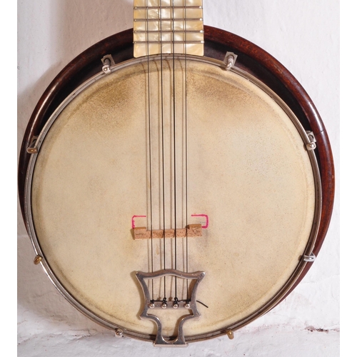 439 - A John Grey & Sons of London - Original vintage 1920s / 1930s banjolele with pearlescent Bakelite de... 