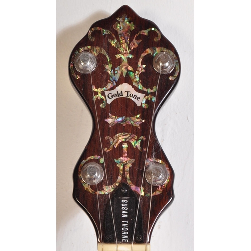 440 - A Gold Tone - OT800LH - Left Handed Banjo. The instrument having an extensively decorated fretboard ... 