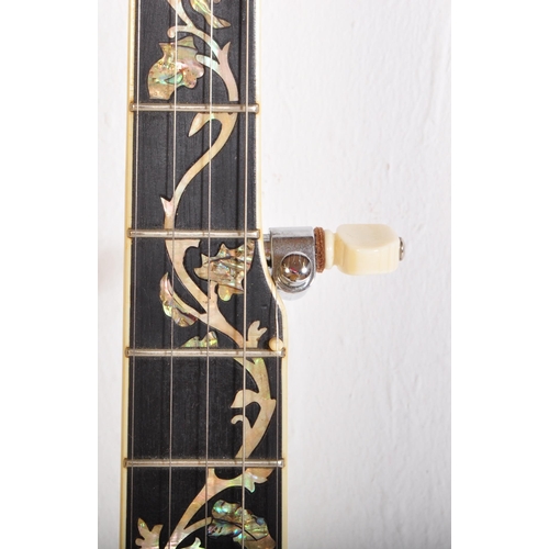 440 - A Gold Tone - OT800LH - Left Handed Banjo. The instrument having an extensively decorated fretboard ... 