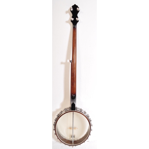 445 - Gold Tone Banjo - OT800 - The instrument set for left handed use. Having a decorated inlaid head sto... 