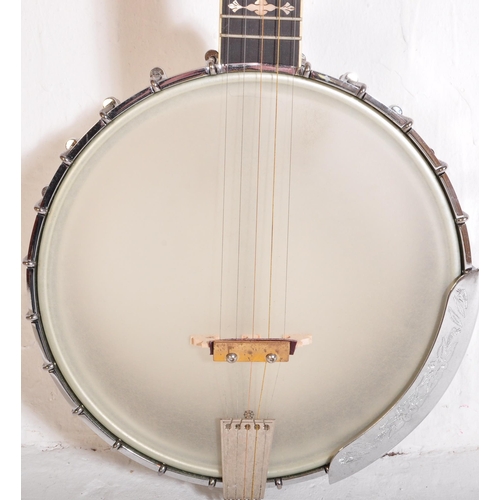 445 - Gold Tone Banjo - OT800 - The instrument set for left handed use. Having a decorated inlaid head sto... 