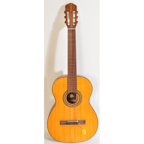 446 - A collection of three vintage acoustic guitars of various sizes. The lot to include a quarter size V... 