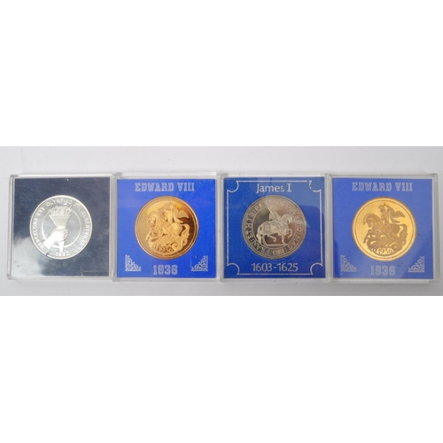 447 - A collection of United Kingdom commemorative coins & medals. The lot to include an assortment of 193... 