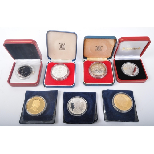 456 - An assortment of United Kingdom commemorative silver coins. The lot to include 'The Concorde Milesto... 