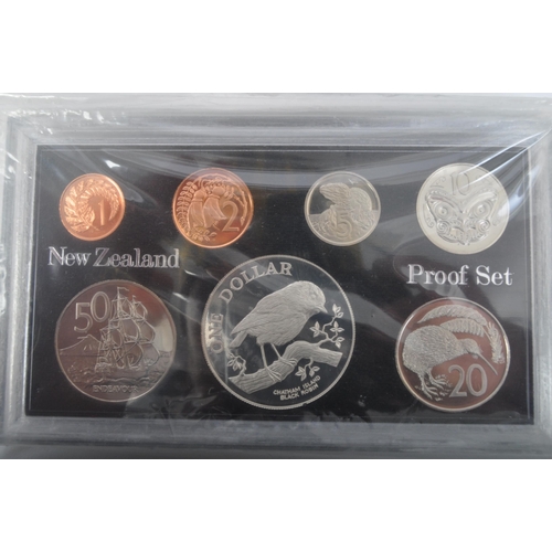 458 - An assortment of three vintage 20th century New Zealand proof coin issue sets. The lot to include a ... 