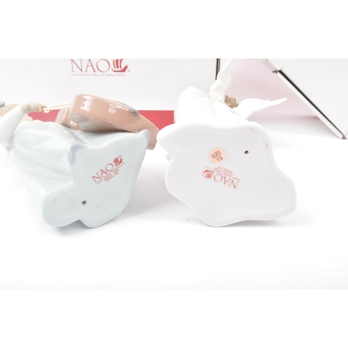 46 - Nao  – 02001879 'Girl With Cello’ & 02000534 'Angel Cuddles’ - original Nao Hand Crafted Porcelain s... 