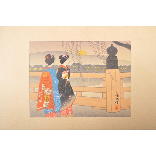 460a - A series of late 19th century and 20th century Japanese prints to include landscapes as well as figu... 