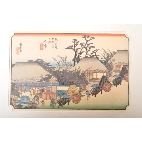 460a - A series of late 19th century and 20th century Japanese prints to include landscapes as well as figu... 