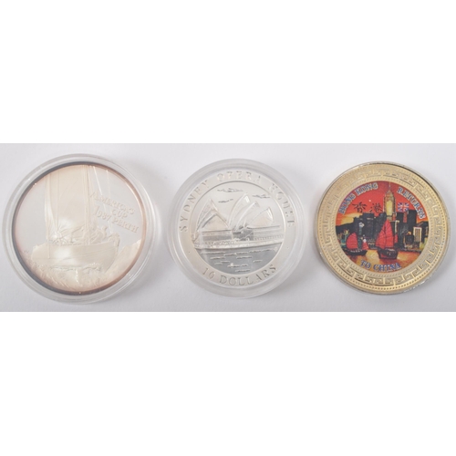 463 - An assortment of United Kingdom commemorative coins. The lot to include a one ounce 999 silver $10 d... 