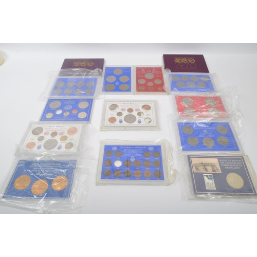 465A - A large collection of vintage 20h century commemorative coins sets. The lot to include two 1970 coin... 