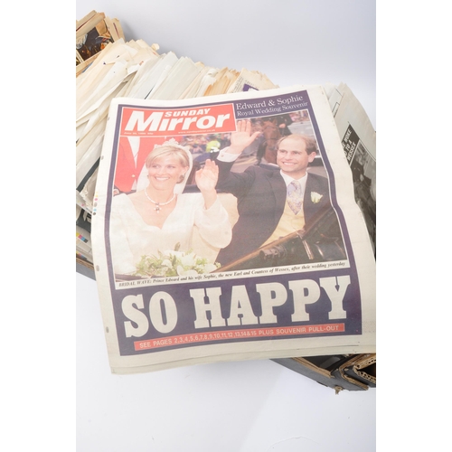 469 - A large collection of vintage 20th Century British newspapers and supplements spanning 1943-2022. Co... 