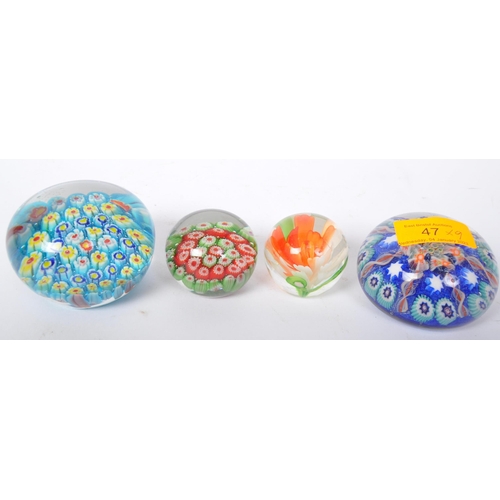 47 - An assortment of vintage 20th century glass paperweights to include Venetian Murano Millefiori paper... 