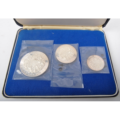 477 - A 20th century 1969 fine silver 999/1000 three medals set commemorating the Investiture of H.R.H Pri... 