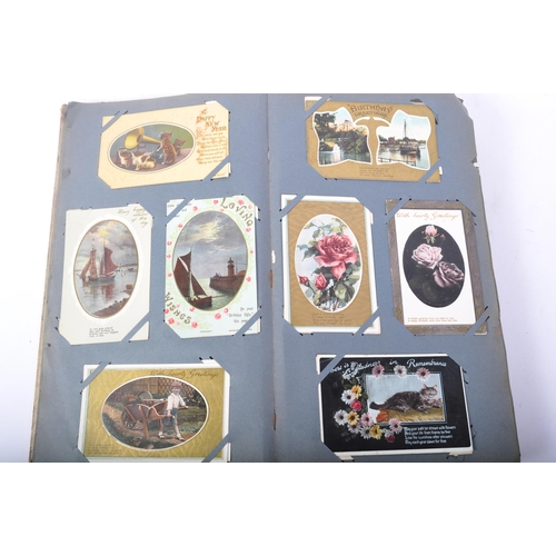 493 - An assortment of early 20th century postcards to include hand coloured Edwardian birthday and greeti... 