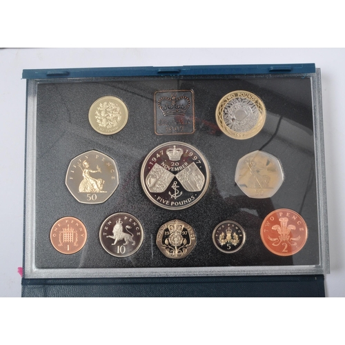 494 - A 1997 United Kingdom Proof Coin Collection with Certificate of Authenticity together with historica... 