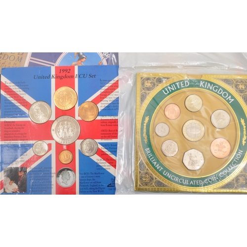 495A - An assortment of vintage 20th century commemorative uncirculated coins sets. The lot to include a 19... 