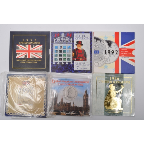 495A - An assortment of vintage 20th century commemorative uncirculated coins sets. The lot to include a 19... 