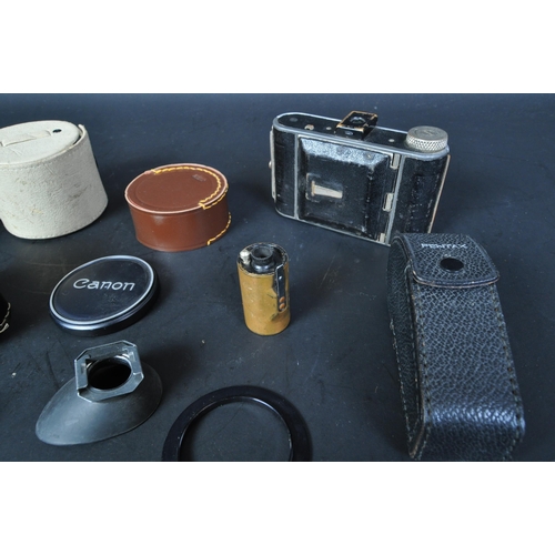 516A - Camera equipment. 1930s Friedrich Deckel of München Germany Folding Compur camera with Misc items in... 