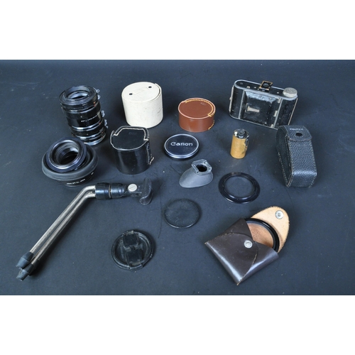 516A - Camera equipment. 1930s Friedrich Deckel of München Germany Folding Compur camera with Misc items in... 