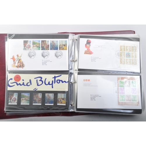 526 - A late 20th century to 2000 extensive presentation packs & first day cover stamps album. The collect... 