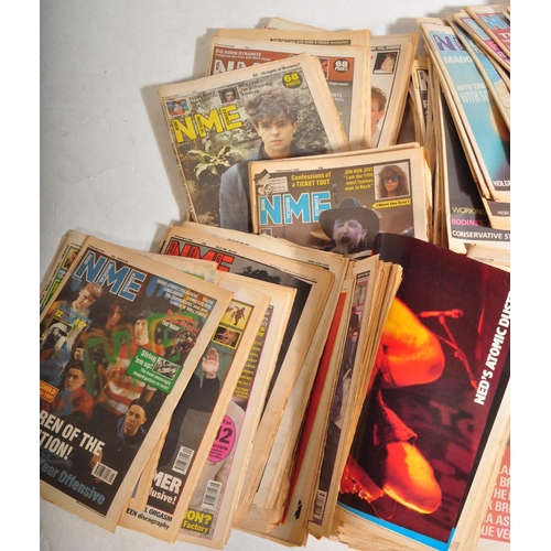 540 - A large collection of New Music Express / NME magazines / paper fold outs. Approximately 280 issues ... 