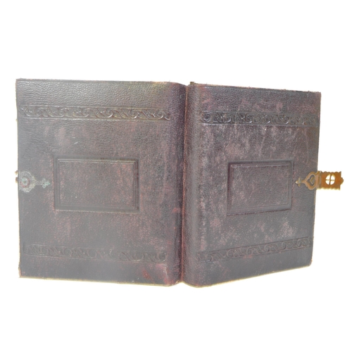 541 - A Victorian 19th century silver gelatin photo album in fitted leather case. The photographs framed i... 