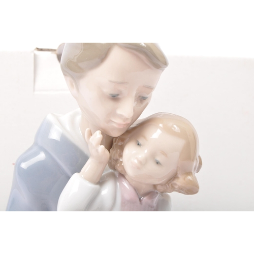 62 - Nao - 02001669 ‘Read Me A Story’ - an original Nao hand crafted porcelain statue / figurine. Made in... 