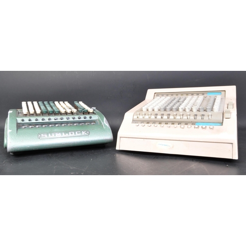 72 - A pair of vintage retro mid 20th century Sumlock comptometer early computers in a green and mauve co... 