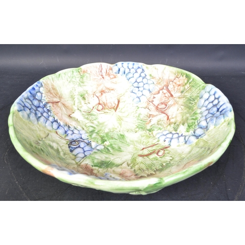 79 - A large vintage 20th century Faiancas Neto & Gomes Portuguese centrepiece fruit bowl. The bowl havin... 