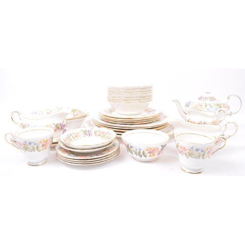 8 - A 20th century vintage bone china Paragon tea and dinner service in the Country Lane pattern. Compri... 