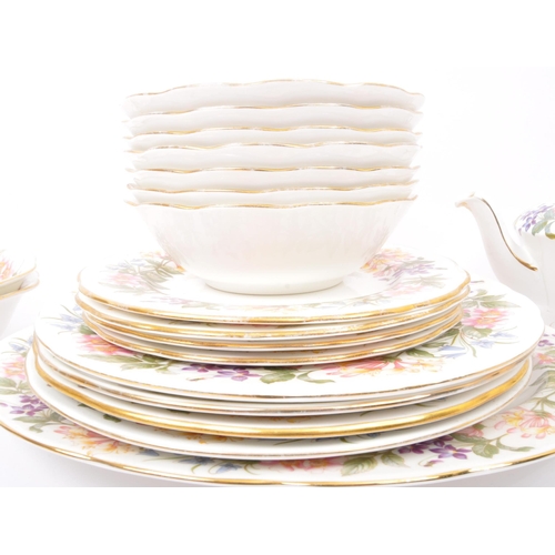 8 - A 20th century vintage bone china Paragon tea and dinner service in the Country Lane pattern. Compri... 