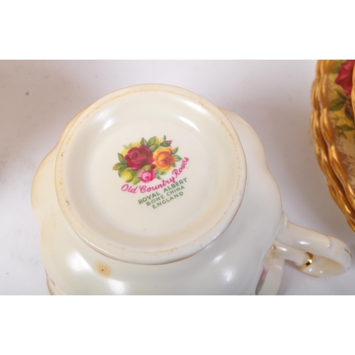 93 - A vintage 20th Century Royal Albert - Old Country Roses tea service set. Comprising of cups, saucers... 