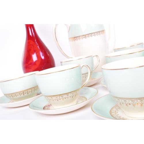 99 - A vintage 20th century Johnsons & Bros china coffee service in light blue & white colourways with ab... 