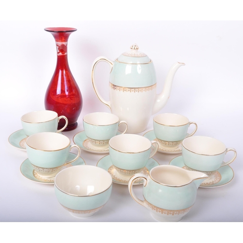 99 - A vintage 20th century Johnsons & Bros china coffee service in light blue & white colourways with ab... 