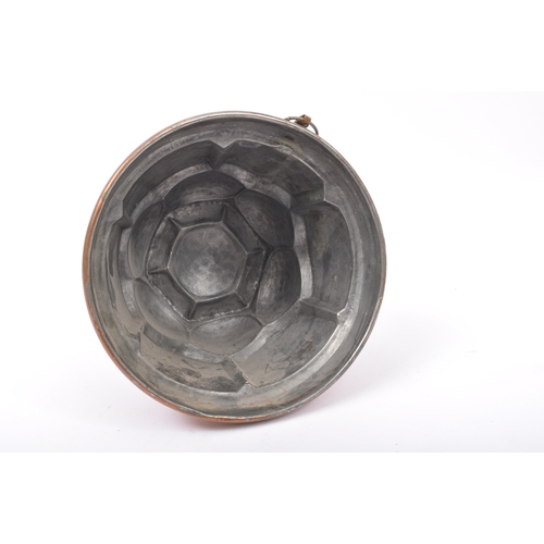 210a - A 19th Century Victorian copper metal jelly jello mould. Of domed form with circular base and metal ... 